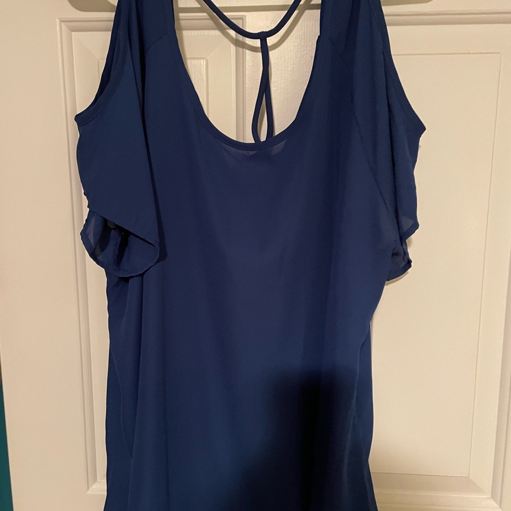 Silky Polyester Blue Top with back detail and cold shoulder cutouts. 3x